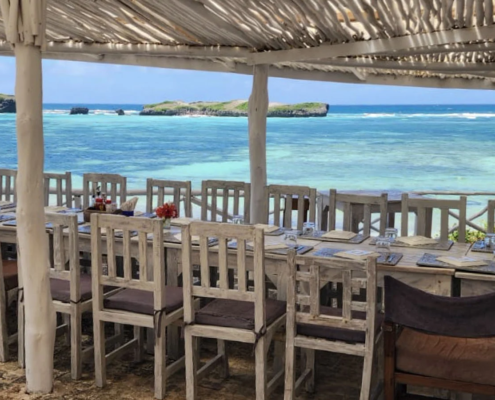 Sunny ocean weather viewed from a beachfront restaurant in Watamu, Kenya.