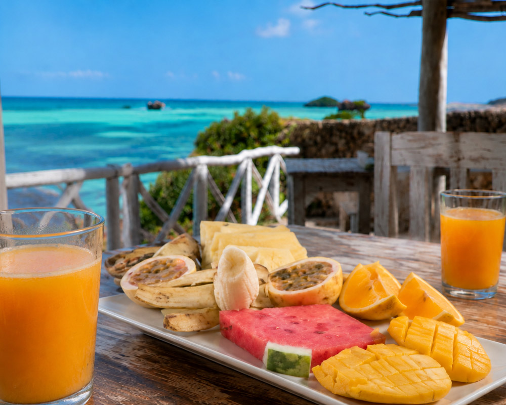 Tropical fruit breakfast overlooking the Indian Ocean at Visiwa Beach Resort