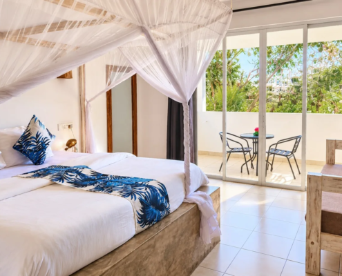 Double room with terrace at Visiwa Beach Resort, Watamu – canopy bed and private terrace
