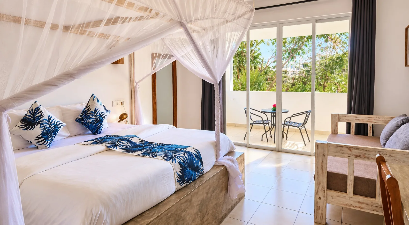 Double room with terrace at Visiwa Beach Resort, Watamu – canopy bed and private terrace