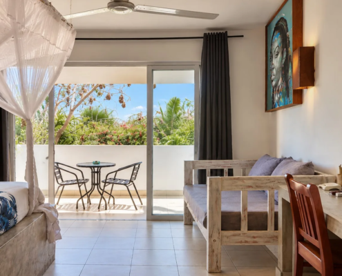 Double Room with Terrace at Visiwa Beach Resort, Watamu – bedroom opening onto the terrace