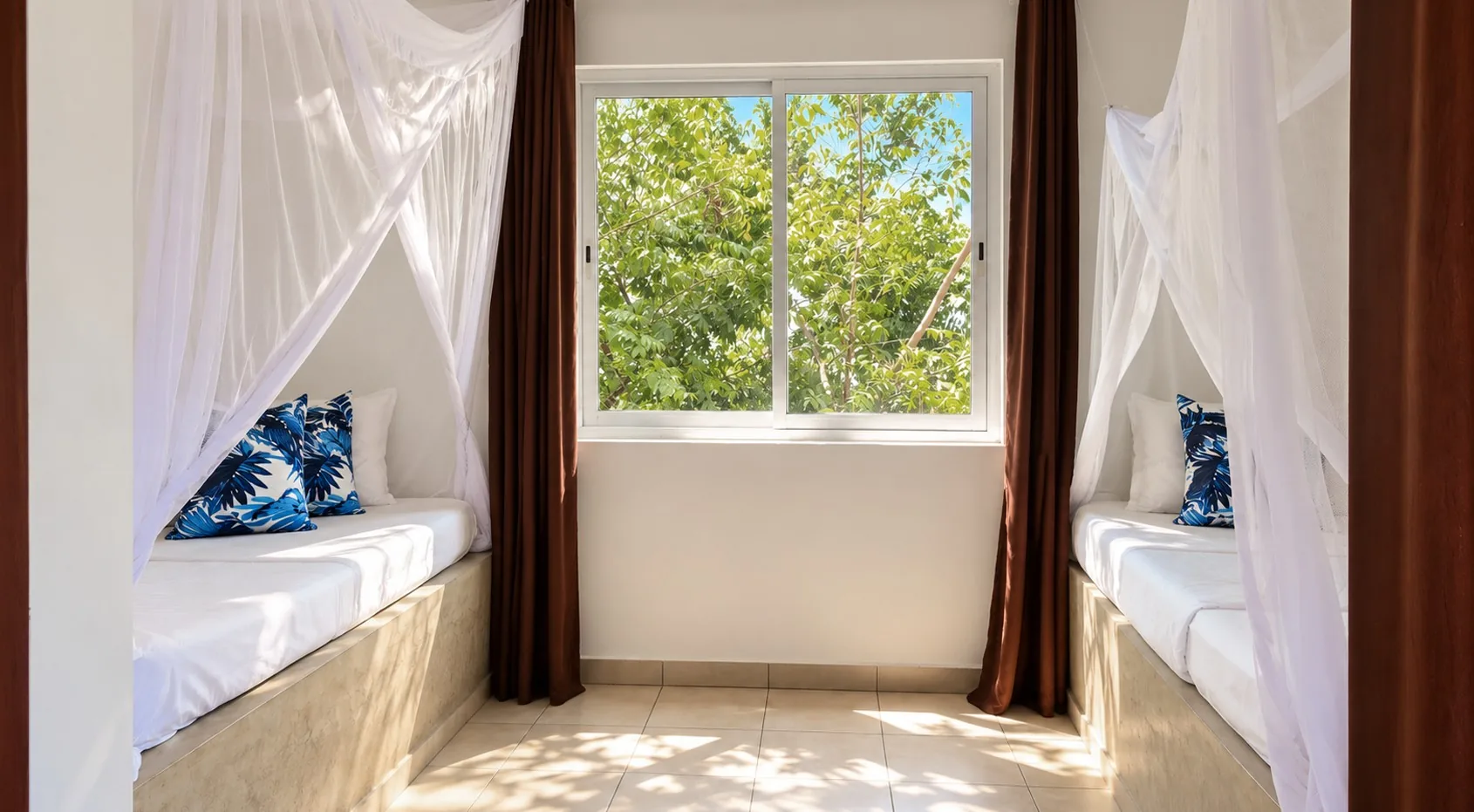 Family Suite second bedroom with single beds at Visiwa Beach Resort, Watamu