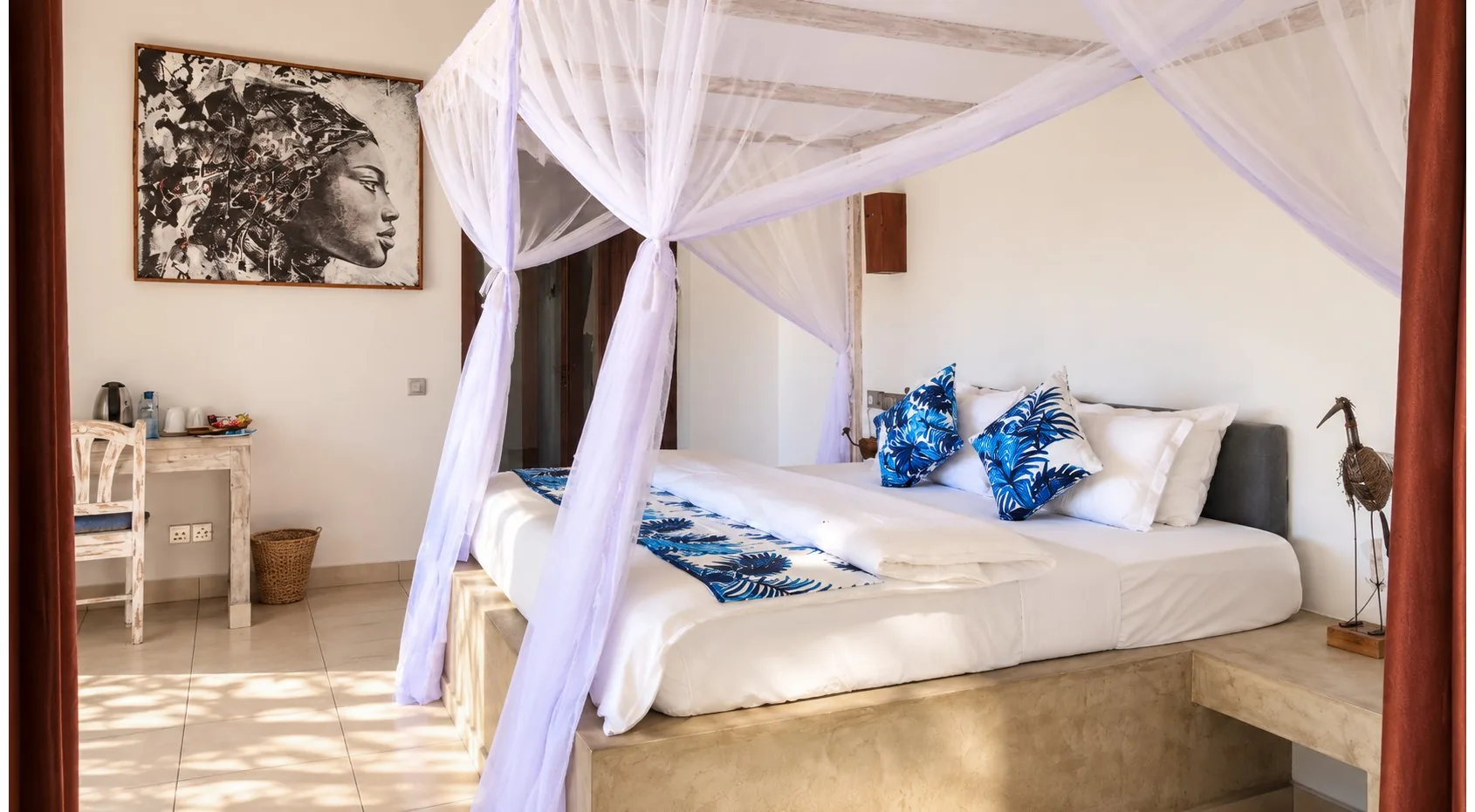 Family Suite master bedroom with canopy bed at Visiwa Beach Resort, Watamu
