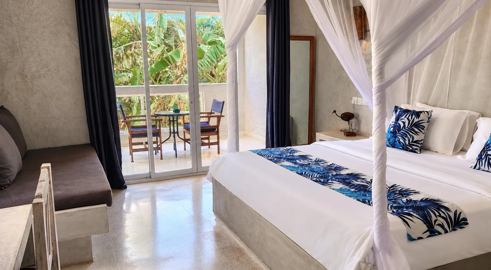 Garden View Room at Visiwa Beach Resort, Watamu – canopy bed and balcony on the tropical garden