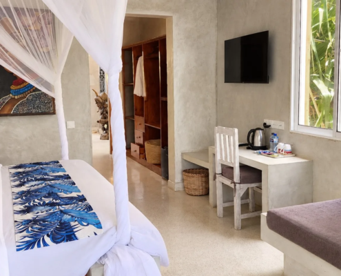 Garden View Room with desk and lounge corner at Visiwa Beach Resort, Watamu