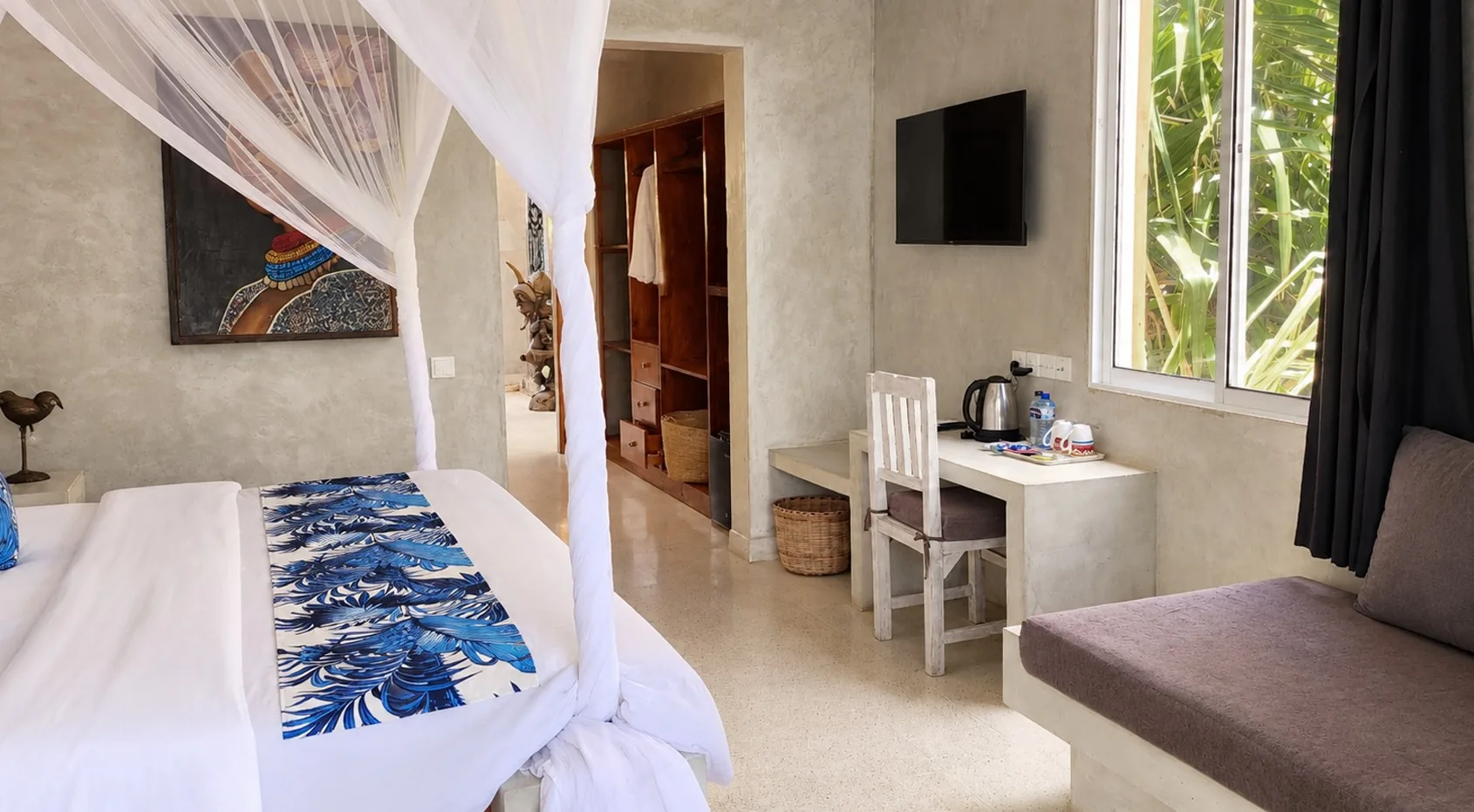 Garden View Room with desk and lounge corner at Visiwa Beach Resort, Watamu
