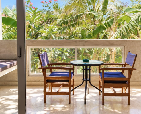 Balcony overlooking the tropical garden from the Garden View Room at Visiwa Beach Resort, Watamu