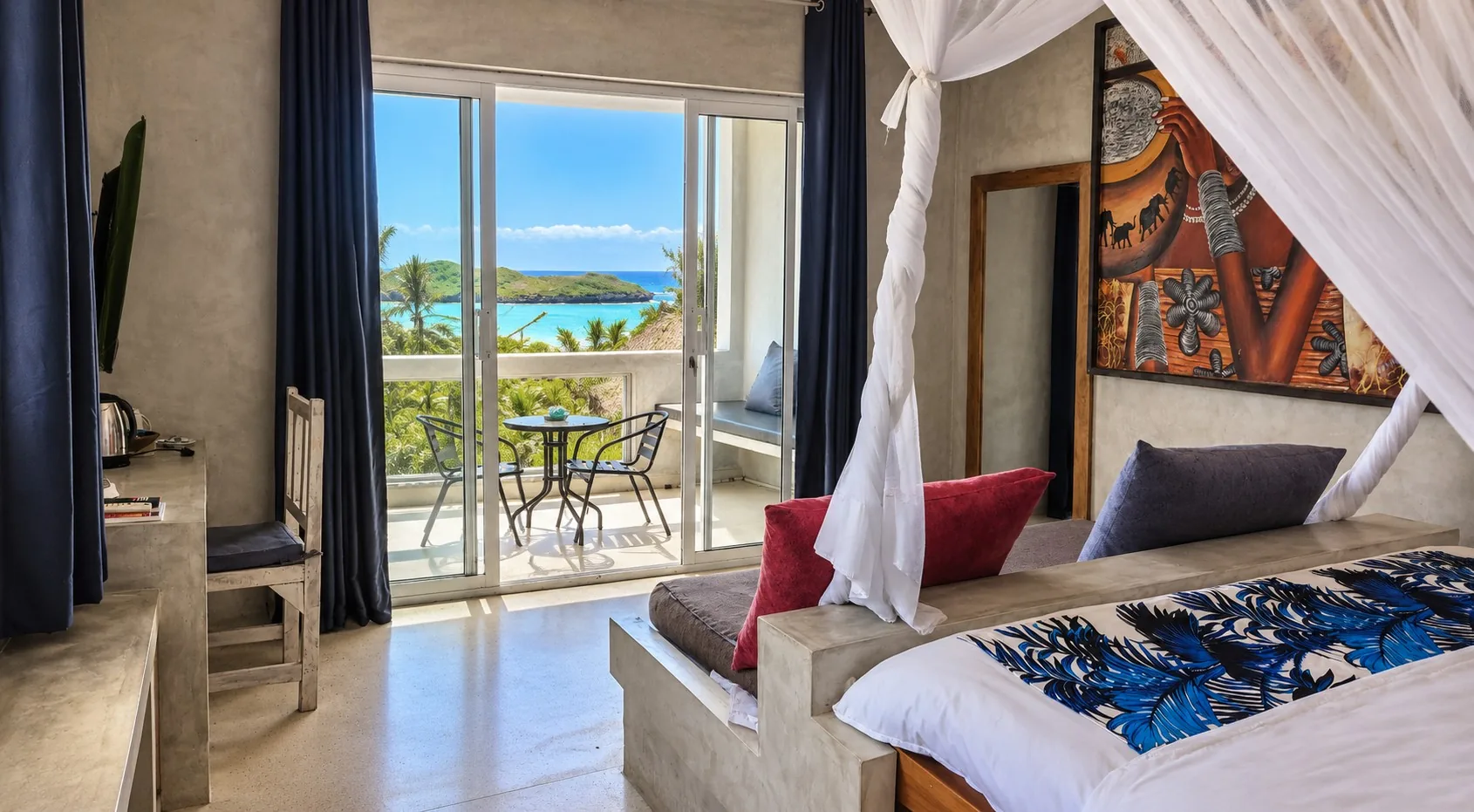 Ocean View Room at Visiwa Beach Resort, Watamu – canopy bed and balcony facing the Indian Ocean